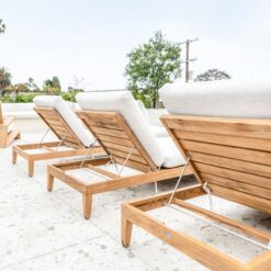 teak wooden sunbed clear water beach