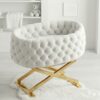 bassinet with gold legs